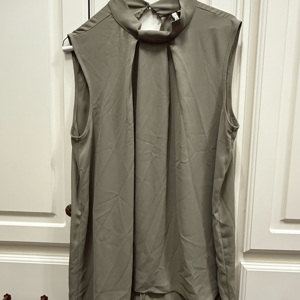 Elegant Sleeveless Blouse in muted soft camo green